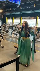 Beautiful girl workout in gym