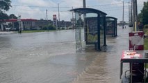 Homeless man saved by helicopter after getting stuck in flood