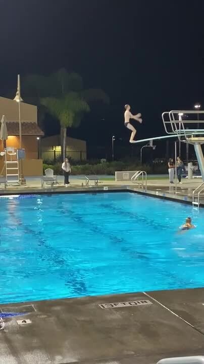 Son Lands Awkwardly in Pool While Attempting Springboard Dive