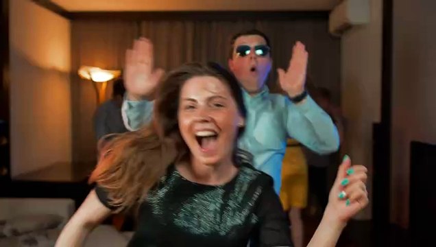 Group of friends partying happily