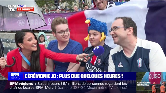 On va en profiter un maximum : L'impatience des spectateurs de la cérémonie d'ouverture des Jeux olympiques malgré les premières gouttes de pluie