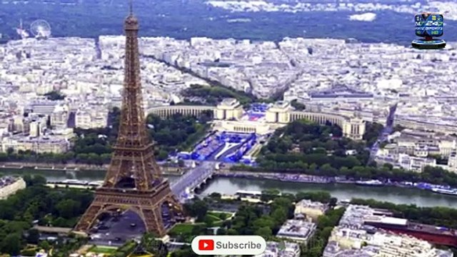 You can't smoke that, Snoop! Rapper lights up Paris by carrying Olympic torch ahead of tonight's opening ceremony- as viewers joke that it looks like a massive cannabis joint