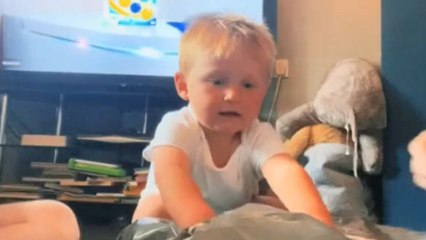 Little boy’s big smile over his surprise car toy gift