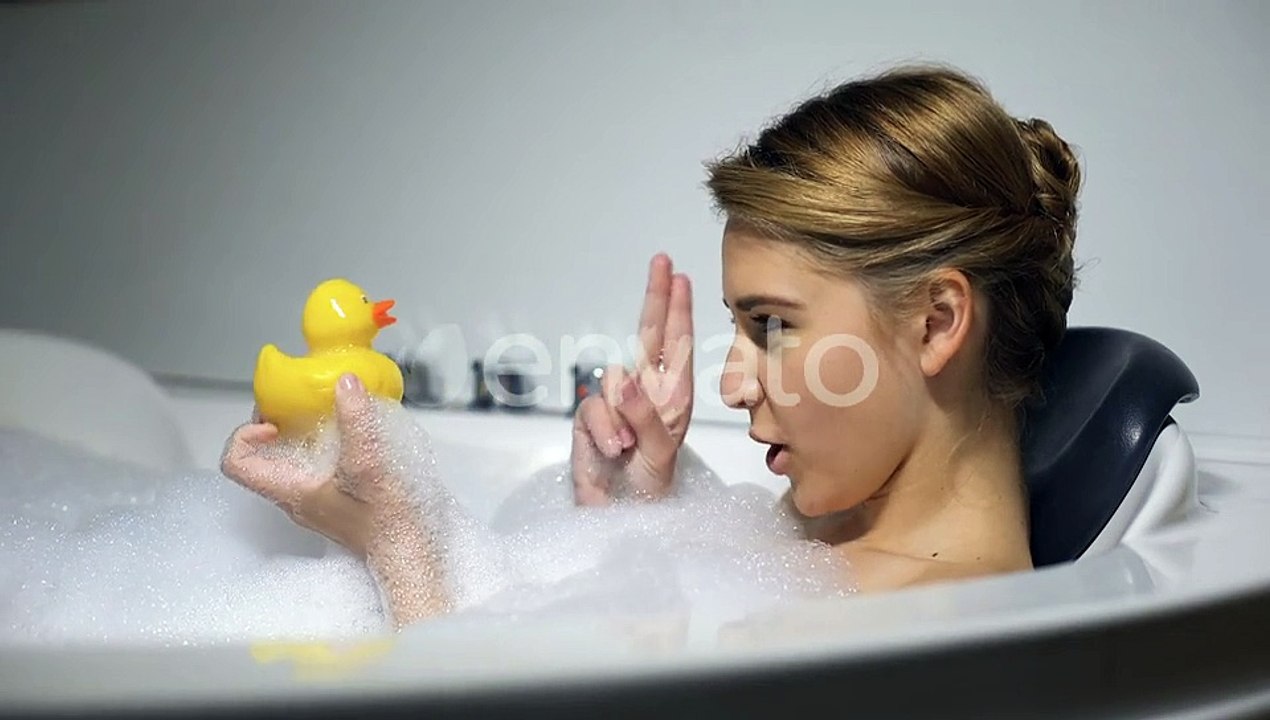 Funny Woman Shouting to Rubber Duck During Bathing With Bubbles, Childish Mood
