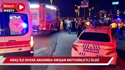Araç ile duvar arasında sıkışan motosikletli can verdi