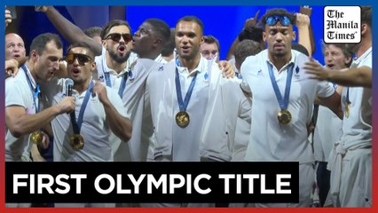 France's rugby sevens team celebrate their Olympic title in a frenzied atmosphere