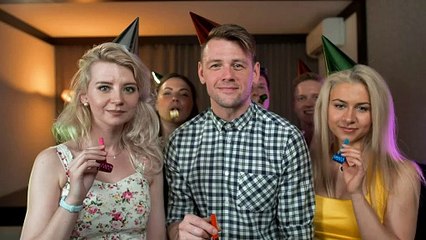 Excited young people partying with party hats