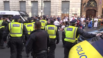 Watch: Police clash with Tommy Robinson supporters as nine arrested