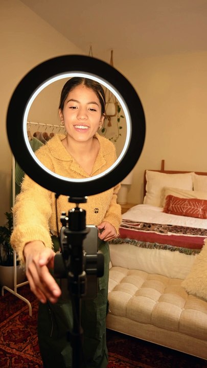 Young Woman Recording Fashion Blog