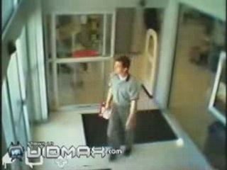 Man walks into glass wall thinking its a door