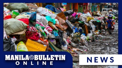 Massive pile of trash in Brgy. Tatalon after flood