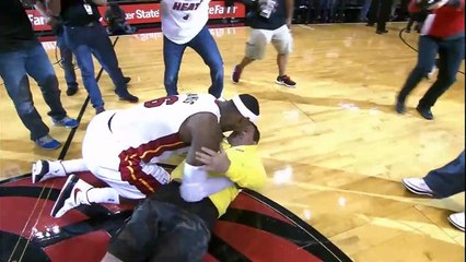 Leborn tackels heat fan who hits $75,000 shots