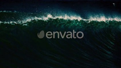 Powerful Crystal Clear Ocean Wave Breaks on the Shore in the Maldives