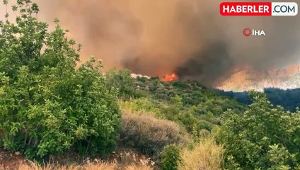 Antalya'daki orman yangınında korku dolu anlar! İtfaiye ekipleri alevlerin arasında kalmaktan son anda kurtuldu