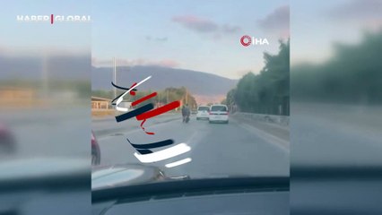 Paten sürerek ölümle dans etti: Tehlikeli yolculuk kamerada