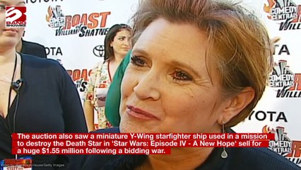 Carrie Fisher's Legendary Gold Bikini Costume Auctions for $175,000