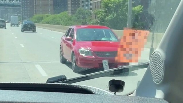 Vehicle captured driving backwards on busy New York highway