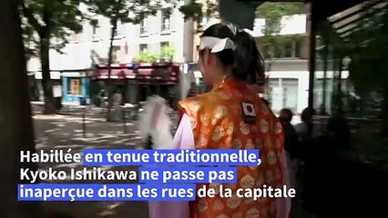 A Paris, une Japonaise assiste à ses neuvièmes Jeux olympiques