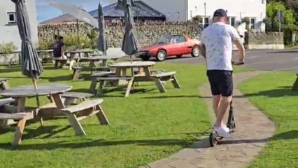 Electric scooter jitters: One friend masters the ride, the other needs a do-over