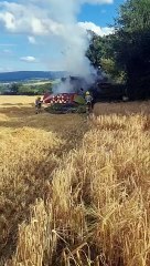 Firefighters deal with combine harvester blaze