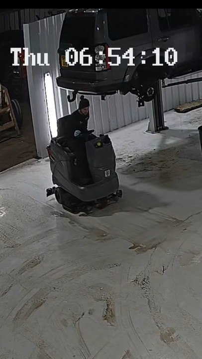 Guy Hits Head on Tow Hook While Cleaning Garage Floor