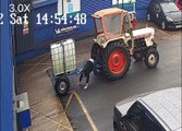 Man Slips and Fall While Climbing Out of Tractor