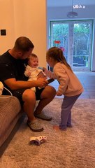 Adorable Baby's Laughter Contagious in Playful Doctor Scene