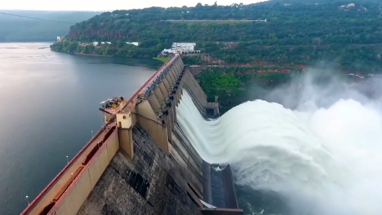 Srisailam Dam Drone Visuals.. శ్రీశైలం డ్యాం 5 గేట్లు 10 అడుగుల మేర ఎత్తి నీటి విడుదల | Oneindia