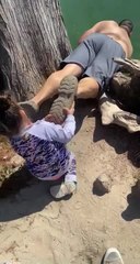 Dad Falls in Water While Attempting to Retrieve Daughter's Toy