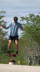 Man Showcases Balancing and Jump Rope Skill