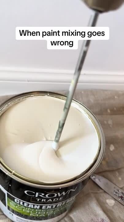 Paint Spills Outside The Can While Mixing