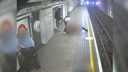 Watch: Moment postman 'shoved in front of train at Oxford Circus Tube station over dirty look'