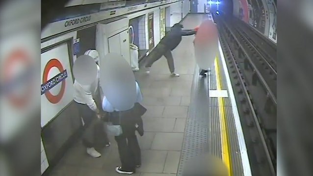 Moment homeless man pushes postman onto Tube tracks caught on CCTV