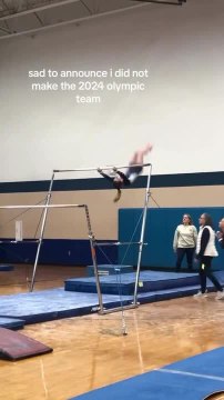 Woman Loses Grip and Falls During Gymnastics Competition