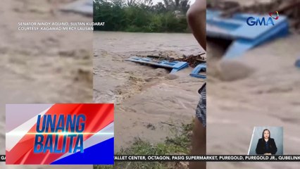 Dump truck, tumagilid at halos malubog sa rumaragasang ilog | Unang Balita