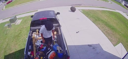 Guy Rushes After Runaway Tire as it Runs Down Street