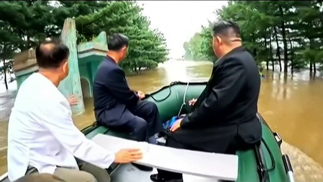 North Korean leader Kim inspects flooded area on rubber boat
