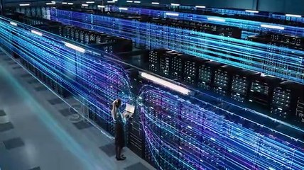 Big Data Center Female Chief Technology Officer Using Laptop Standing In