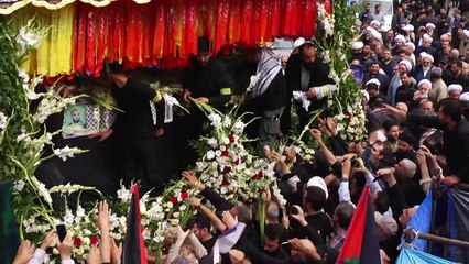 Des Iraniens se rassemblent pour le cortège funèbre de Haniyeh à Téhéran