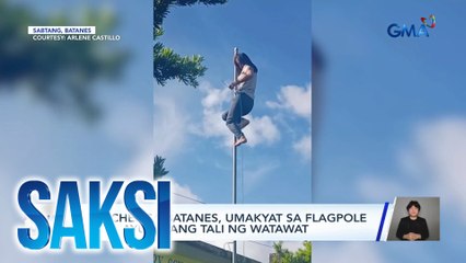Teacher sa Batanes, umakyat sa flagpole para ayusin ang tali ng watawat | Saksi