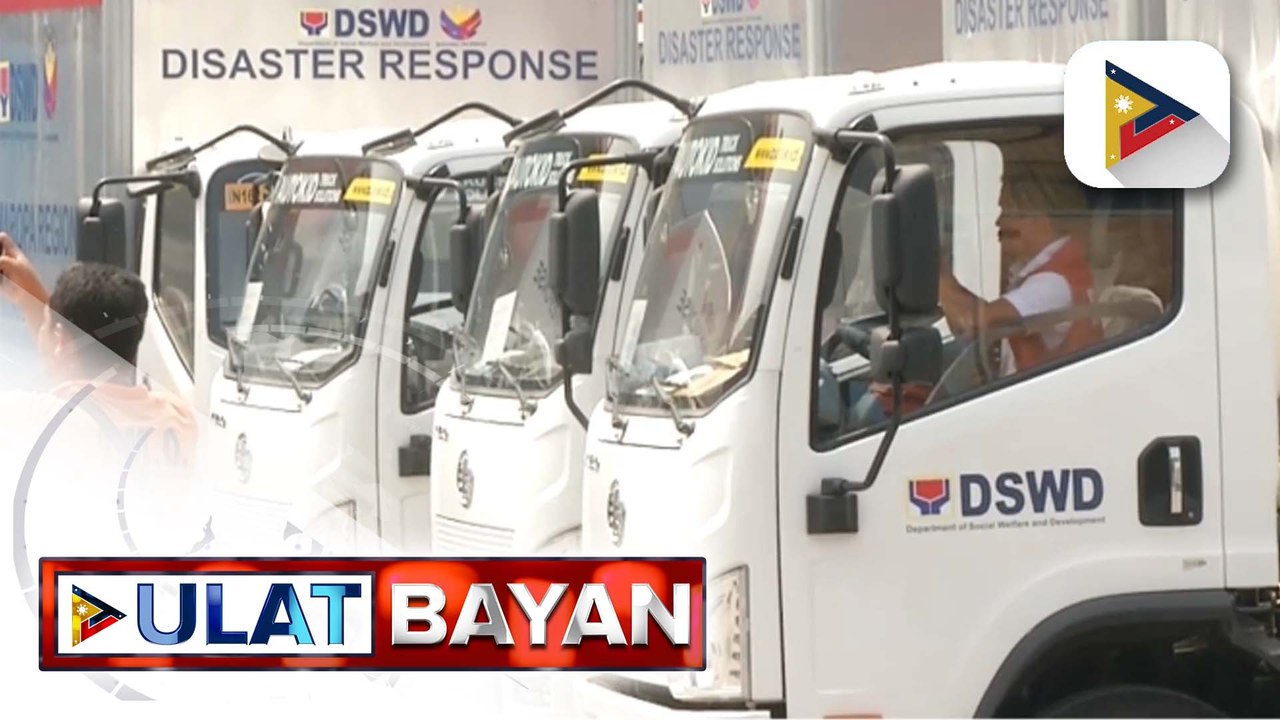 11 DSWD delivery trucks at heavy duty forklifts...
