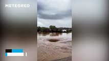 A large hole appears in the ground after torrential rains in Jazan, Saudi Arabia