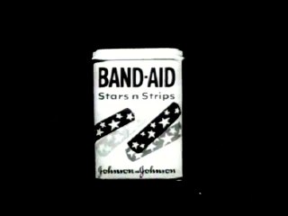 1960s colorful kid Band Aid bandages - black and white TV commercial