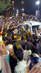 Naezy surrounded by fans, bringing the hustle and energy to the streets.