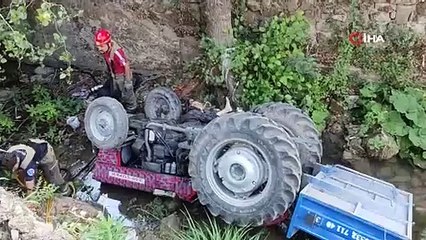 Kontrolden çıkan traktör dere yatağına uçtu