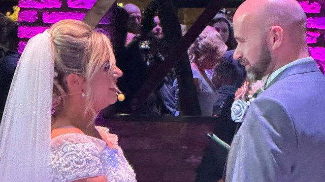 Bride surprised her groom at their wedding by singing as she walked down the aisle