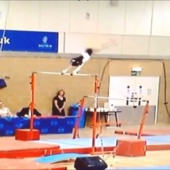 Girl Hits Bar While Trying to Swing at Gymnastics Competition