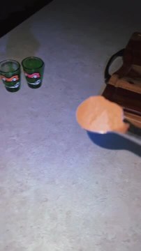 Person Making Chocolate Milk Fails at Using Spoon Attached to Drill