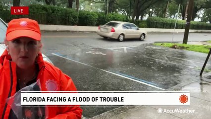 Winds roar and flooding begins as Debby swirls through northern Florida