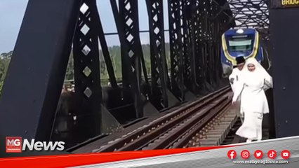 MG Viral : Bahaya! Pasangan Pengantin Bergambar di Landasan Keretapi